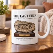 The Last Fuck Fossil Discovery mug in living room